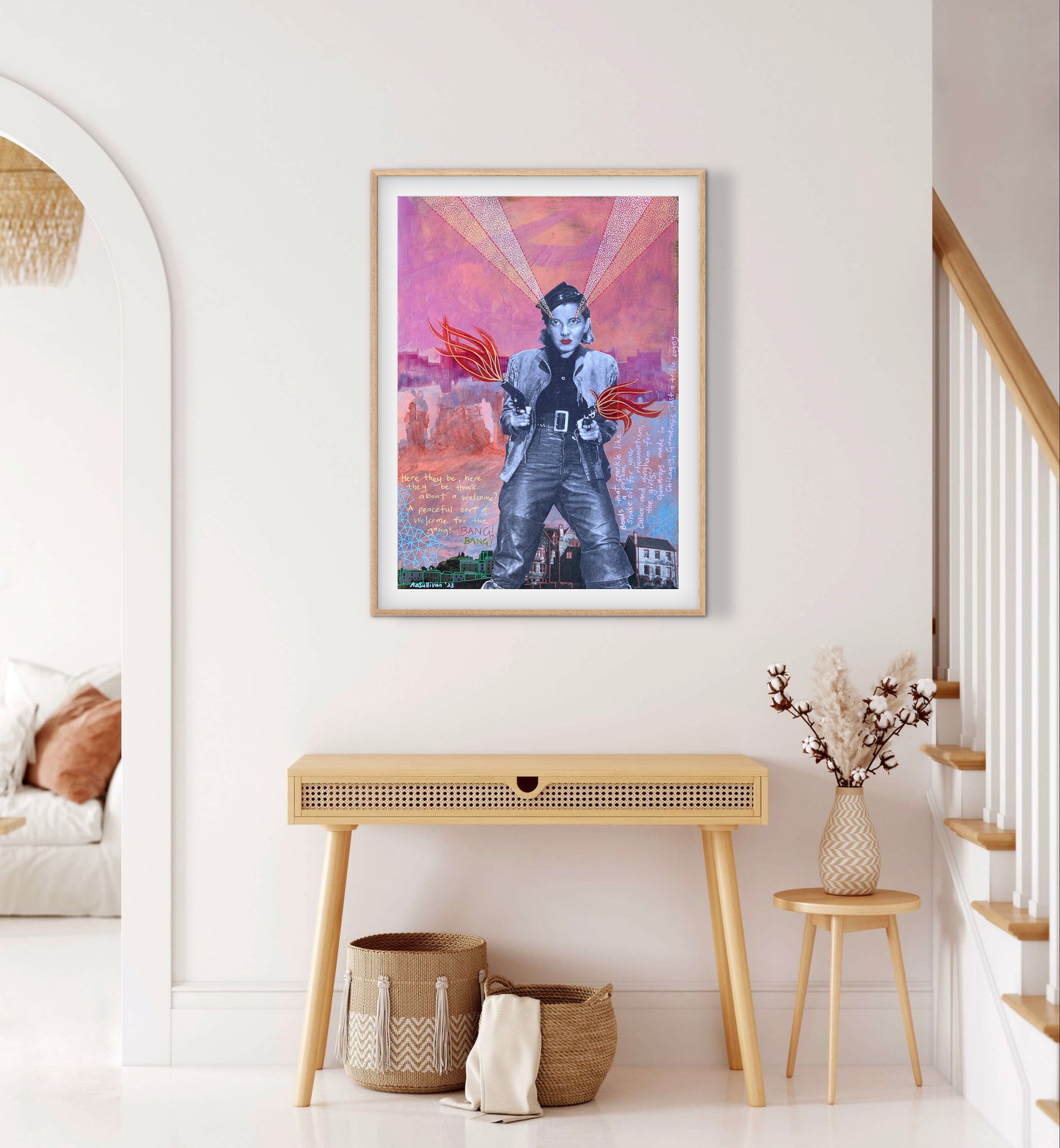 Framed artwork of a person with a guitar on a wall in a home setting.