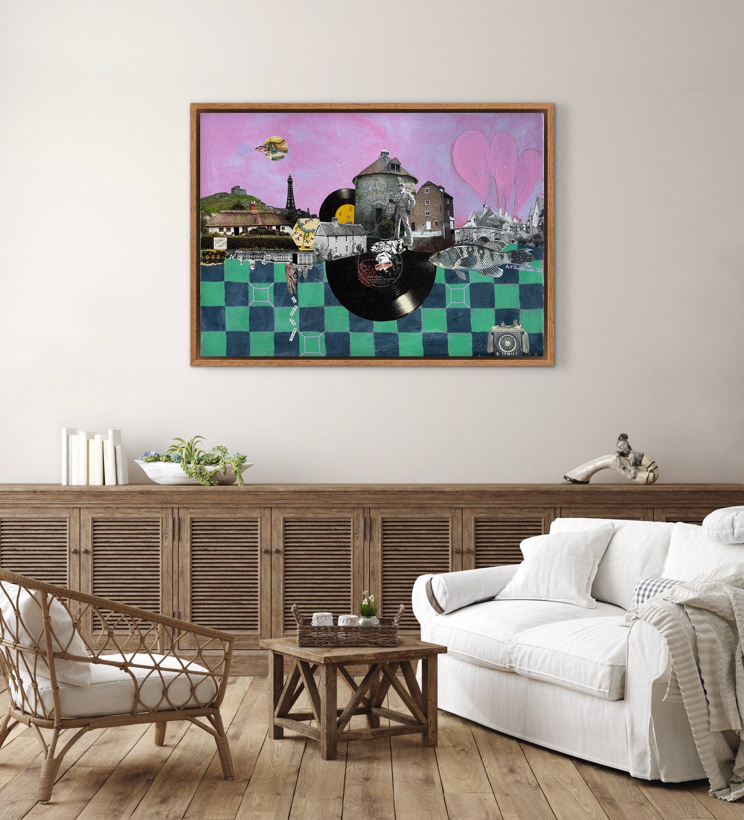 Living room with a colorful abstract painting on the wall, white sofa, wooden sideboard, and chairs.