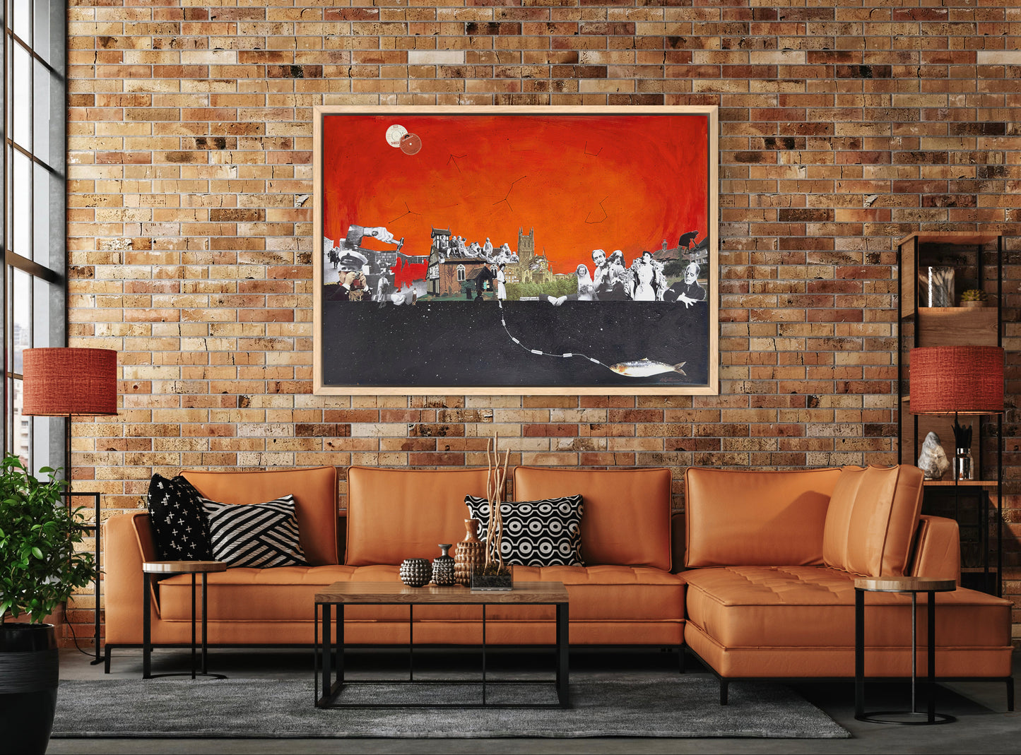 Modern living room with brown sectional sofa, coffee table, and brick wall with artwork.
