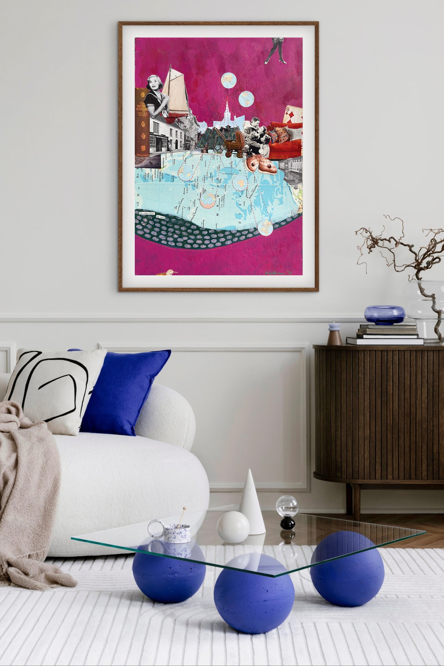 Modern living room with colorful abstract art on the wall, glass coffee table, and decorative items.