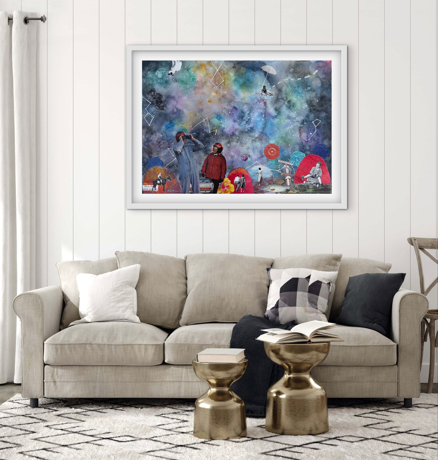 Living room with a beige sofa, decorative pillows, and a colorful abstract painting on the wall.