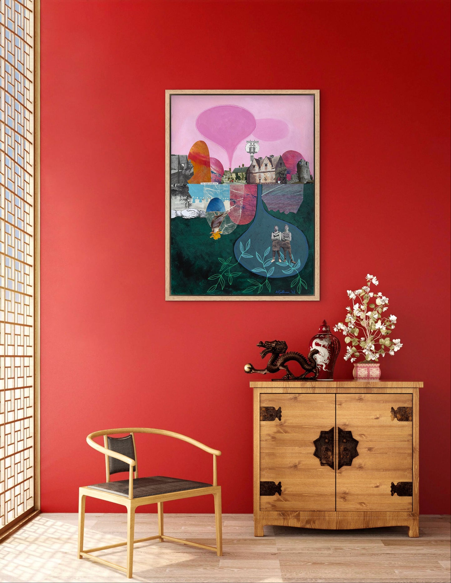 Wooden cabinet with decorative items against a red wall with a colorful abstract painting.