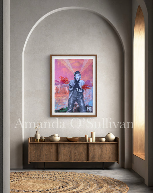 Framed artwork on a wall above a wooden console table with decorative items.